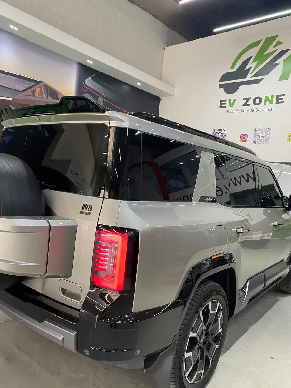 A BYD SUV in a service bay at the EV Zone workshop in Sharjah